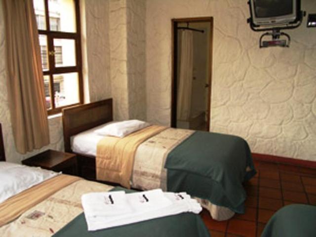 Hotel Quito Antiguo Szoba fotó