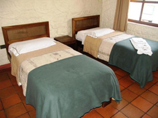 Hotel Quito Antiguo Szoba fotó